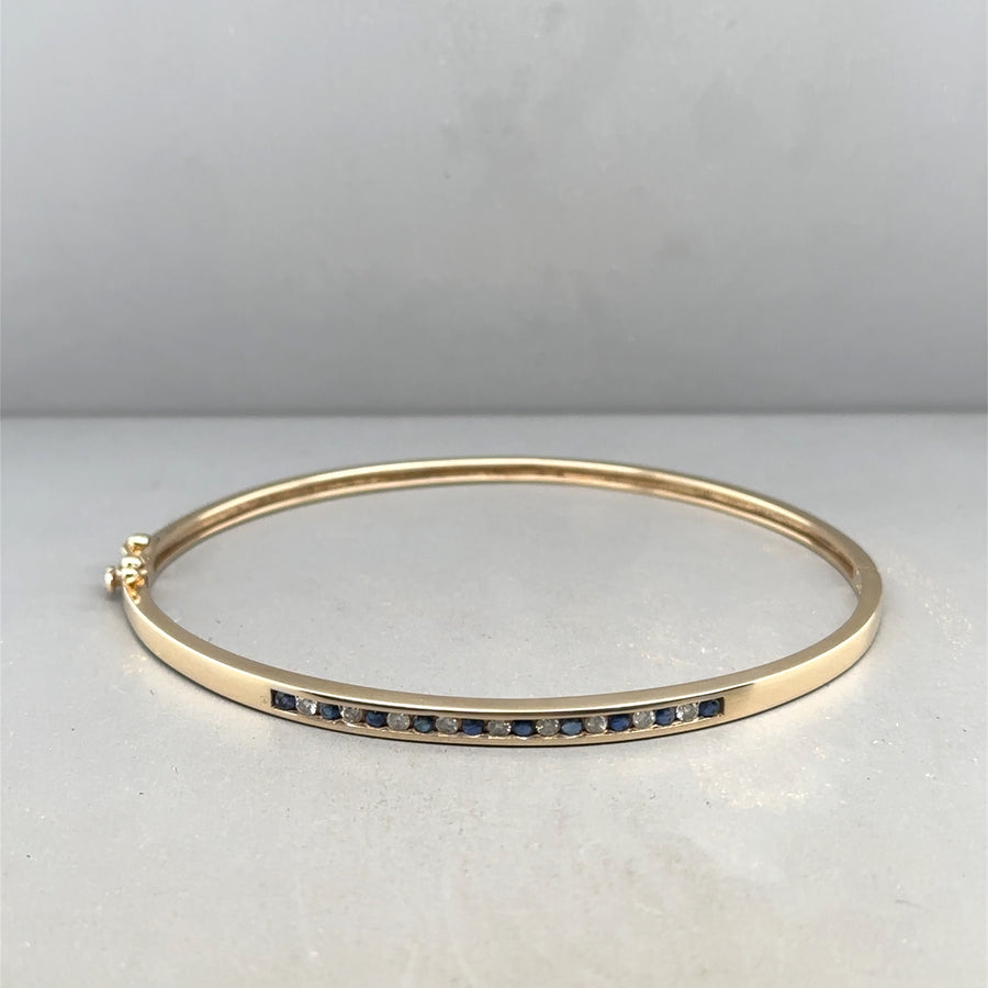 9ct Yellow Gold Sapphire and Diamond Set Bangle (c. 0.15 - 0.20ct)