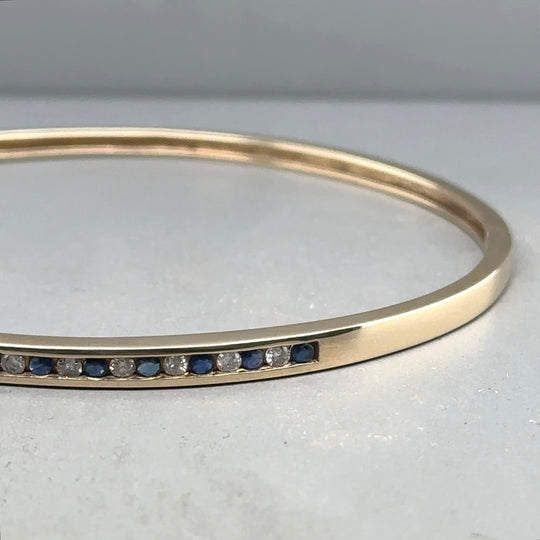 9ct Yellow Gold Sapphire and Diamond Set Bangle (c. 0.15 - 0.20ct)