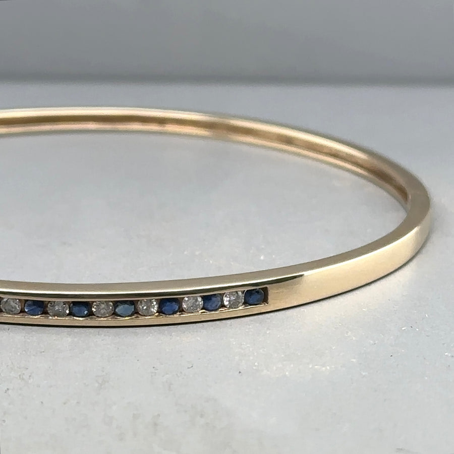 9ct Yellow Gold Sapphire and Diamond Set Bangle (c. 0.15 - 0.20ct)