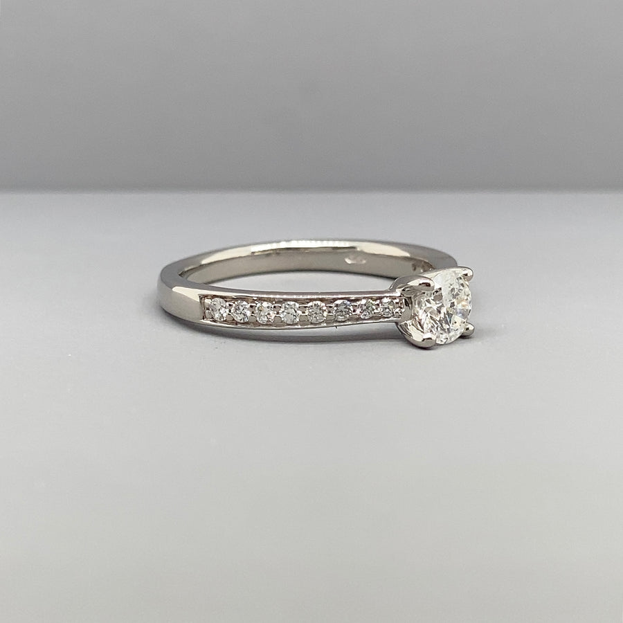 Platinum Single Stone Diamond and Diamond Shoulder Ring (c. 0.75ct) - Size O