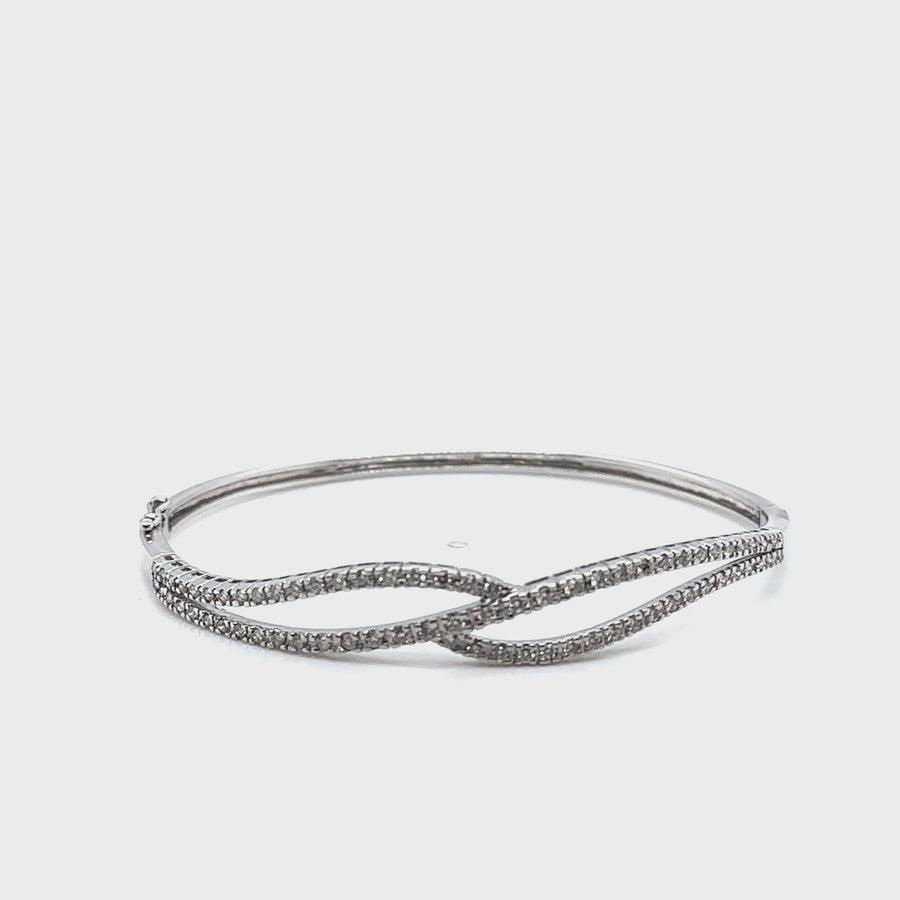 18ct White Gold Diamond Set Bangle (c. 0.72ct)